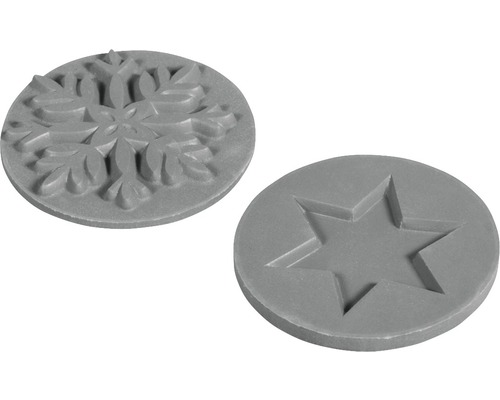 Deux formes rondes : l’une avec un motif de flocon de neige, l’autre avec un motif d’étoile.