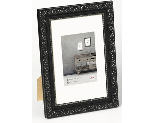 Cadre photo noir avec décorations florales pour photos