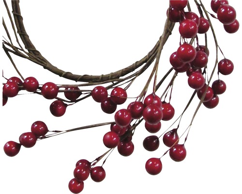 Couronne décorative avec des baies rouges et des branches