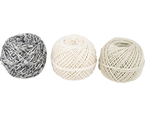 Trois pelotes de fil à lier