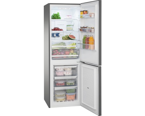 Réfrigérateur-congélateur ouvert, rempli de nourriture