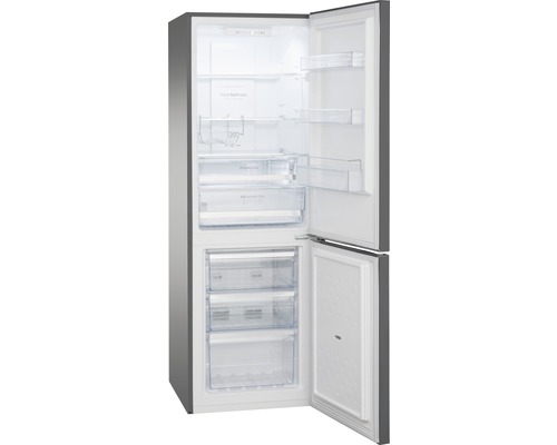 Réfrigérateur ouvert avec compartiment congélateur et plusieurs compartiments de rangement.