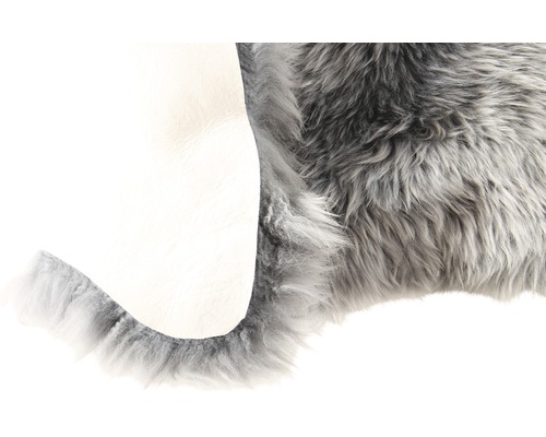Tapis en peau de mouton grise avec dessous en cuir