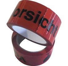 Deux rouleaux de ruban adhésif d''avertissement rouge avec le mot ''Vorsicht'' en lettres noires.