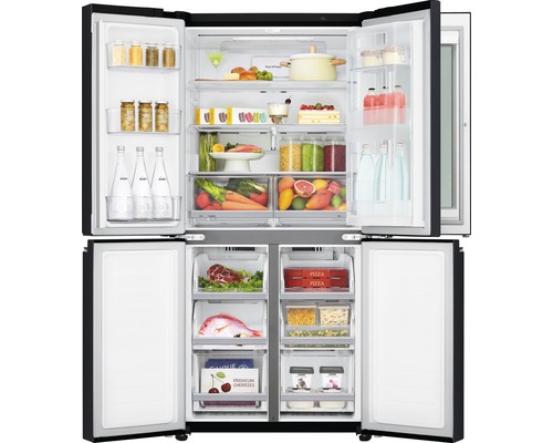 Réfrigérateur à quatre portes ouvert avec des aliments