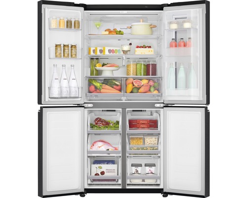 Réfrigérateur combiné américain ouvert avec divers aliments