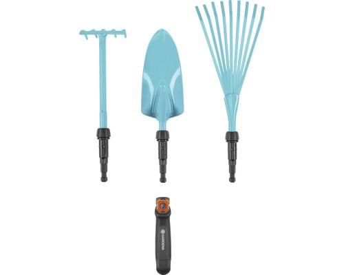 Ensemble d''outils de jardin avec râteau, pelle, balai à feuilles et manche