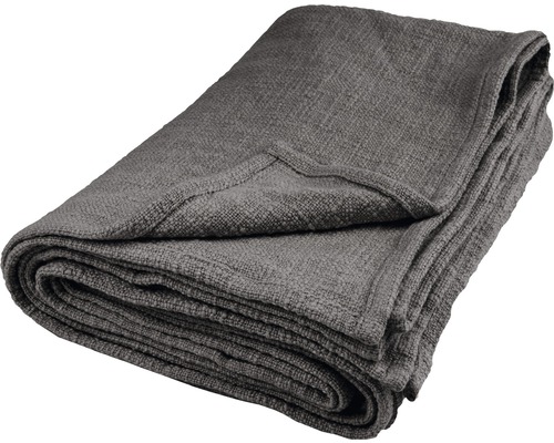 Gefaltete graue Tagesdecke mit Textur