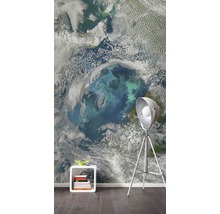 Fototapete mit Erdkugel-Motiv in einem Wohnzimmer