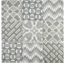 Motif de carreaux avec des motifs géométriques et floraux