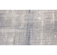 Surface en béton grise avec des lignes et des traces d''utilisation