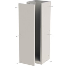 Meuble de salle de bain blanc avec porte ouverte et étagères