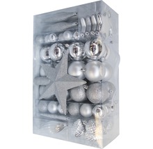 Set de décorations de sapin de Noël avec étoile, boules et pommes de pin dans une boîte transparente