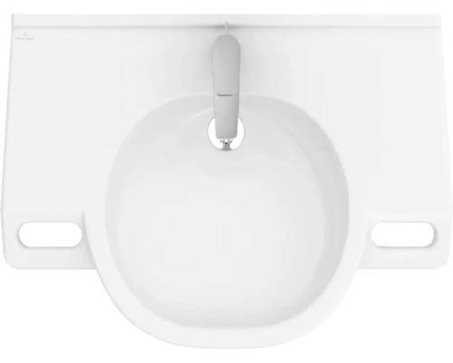 Vue de dessus d''un lavabo blanc avec robinetterie