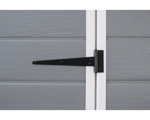 Charnière en T noire sur une porte en bois grise