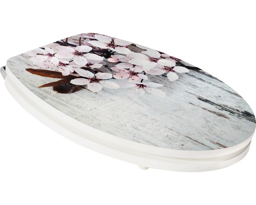 Toilettendeckel mit Blumenmuster auf Holzoptik