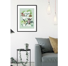 Affiche encadrée du Livre de la jungle avec la citation ''Keep the wild in you'' comme décoration dans le salon