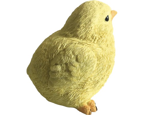 Poussin jaune comme décoration de jardin