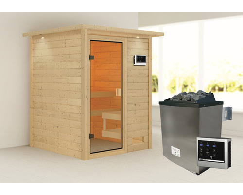 Sauna en bois avec porte en verre et poêle de sauna avec pierres