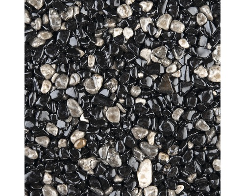 Nahaufnahme von Kies mit einem Gemisch aus schwarzen und grauen Steinen.