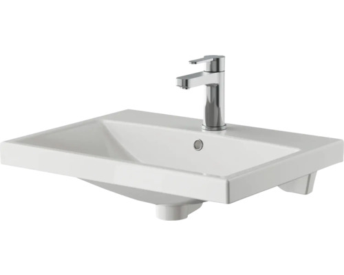 Vasque en céramique avec robinet pour la salle de bain