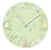 Dekorative Uhr mit Blumenmuster und dem Schriftzug Krönchen liegen lassen, Haare zerzausen und das Leben rocken