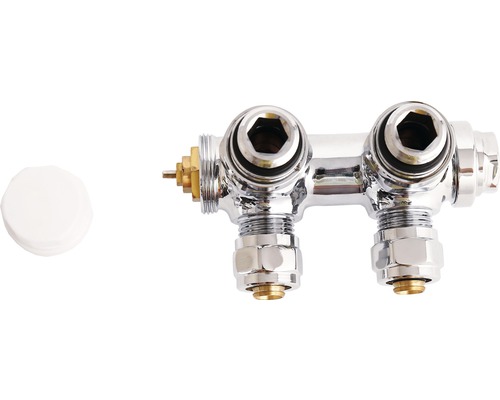 Distributeur de circuit de chauffage avec raccords et bouchon borgne