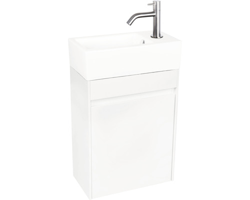 Lavabo blanc avec meuble sous-lavabo et robinet pour la salle de bain