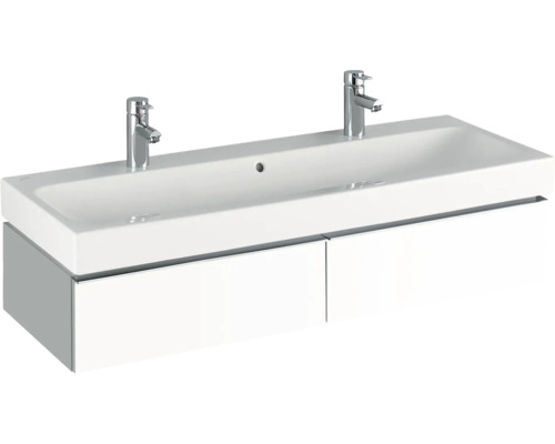 Lavabo avec deux robinets et meuble sous-lavabo pour la salle de bains