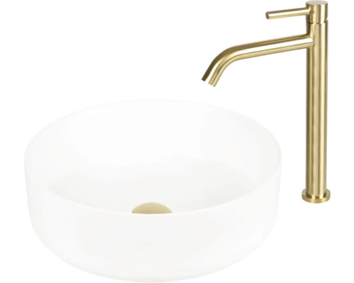 Waschtisch aus Keramik mit goldfarbener Armatur