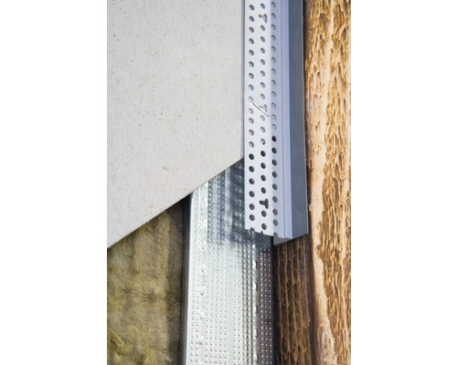 Vue détaillée d''une construction murale avec profilé d''enduit