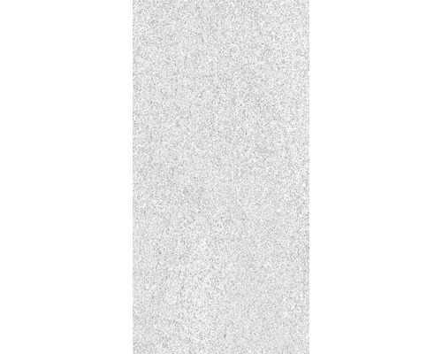 Gros plan d'une surface d'enduit minéral