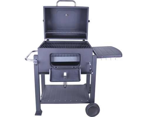 Barbecue au charbon de bois avec couvercle ouvert et tablette latérale