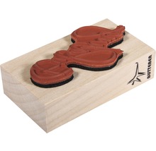 Stempel mit Motiv auf Holzblock