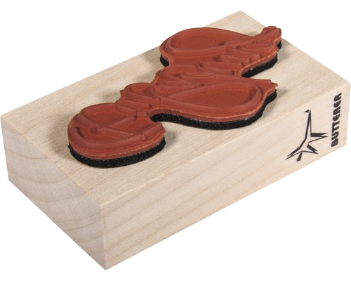 Stempel mit Motiv auf Holzblock