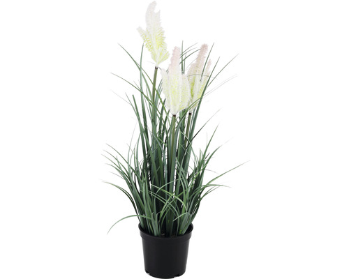 Dekorative Kunstpflanze mit Federn im Topf