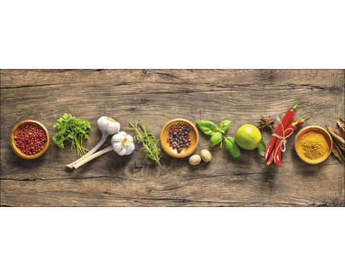 Arrangement de diverses herbes et épices sur une table en bois