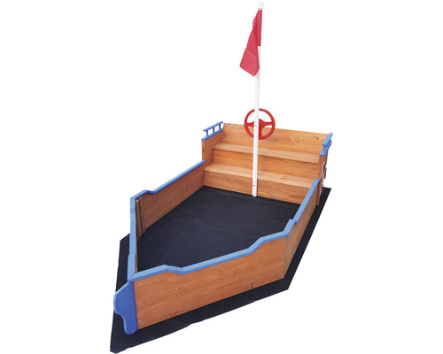 Bac à sable en forme de bateau avec gouvernail et drapeau