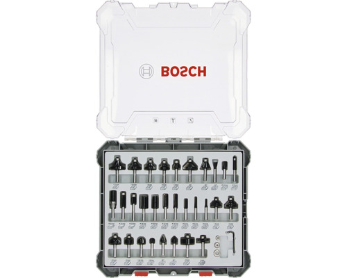 Bosch Fräsersatz mit verschiedenen Fräsern und Zubehör in einer transparenten Aufbewahrungsbox.