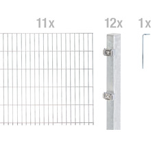 Onze éléments de clôture, douze poteaux de clôture et une clé pour la construction de clôtures.