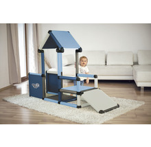 Maisonnette pour enfants avec toboggan dans le salon