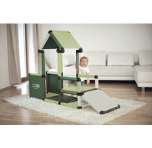 Maisonnette avec toboggan et logo Quadro dans le salon