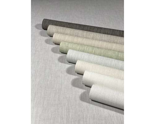 Mehrere Rollen Stoffmuster in verschiedenen Farbtönen