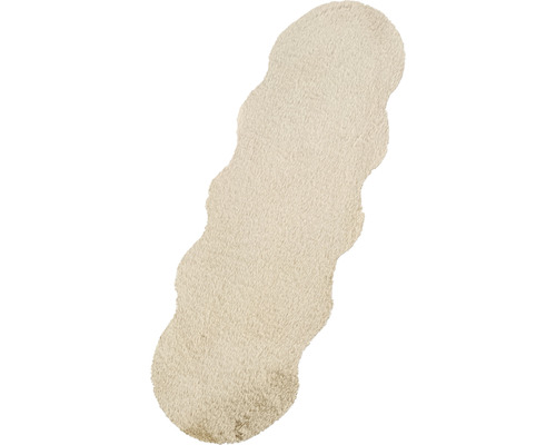 Tapis beige avec bord ondulé