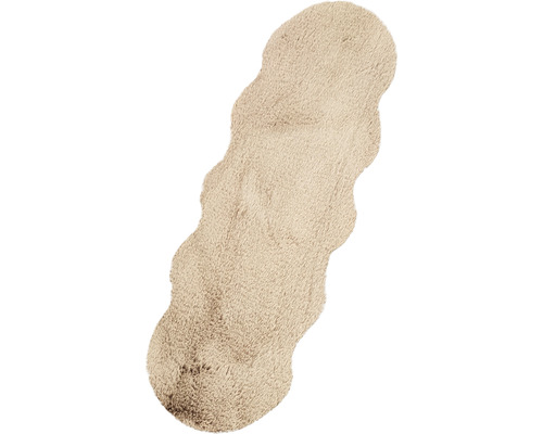 Tapis de bain beige à bord ondulé