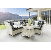Ensemble de meubles de jardin avec canapé d'angle, table avec plateau en verre et coussins sur terrasse avec vue sur le lac