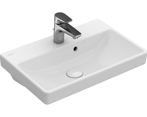 Waschbecken aus Keramik mit Armatur
