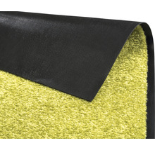 Vue détaillée d''une sous-couche de tapis verte avec un dos antidérapant