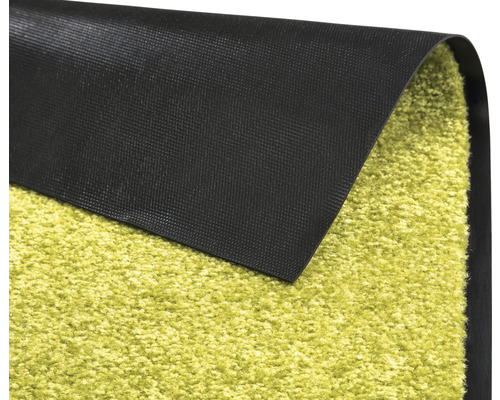 Vue détaillée d''une sous-couche de tapis verte avec un dos antidérapant