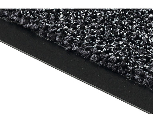 Vue détaillée d''un tapis anti-salissures avec bordure noire.